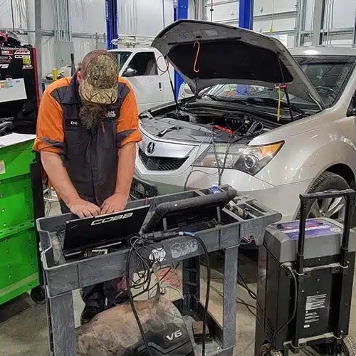 Diagnostic in Blowing Rock, NC. Image of our highly trained techinicians using state-of-the-art diagnostic tools to find the vehicles problem.
