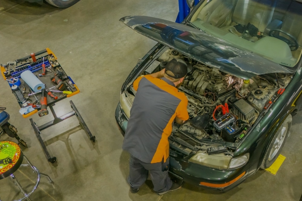 Back-to-School Car . Prep in Blowing Rock NC At L&N PerformanceMechanic inspecting a car during maintenance at an auto repair shop