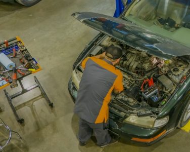 Back-to-School Car . Prep in Blowing Rock NC At L&N PerformanceMechanic inspecting a car during maintenance at an auto repair shop