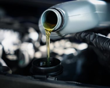 Winter Oil Change in Blowing Rock, NC At L&N Performance. Auto technician performing winter engine oil change.